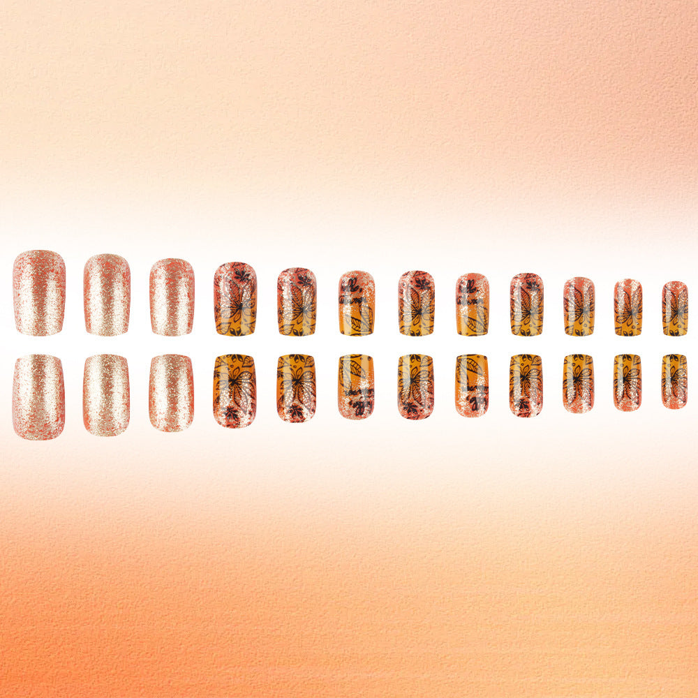 Whimsical Garden Press-On Nail Set with Medium Length Square Shape Shimmering Rose Gold Color and Beautiful Butterfly Floral Design