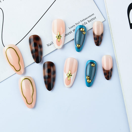 Chic Elegance Long Almond Pink and Brown Tortoise Nail Set with Unique Gold Accents