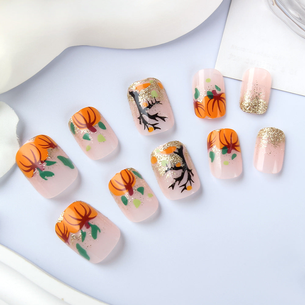 Autumn Harvest Elegant Medium Square Press-On Nail Set in Soft Pink with Vibrant Orange Floral Designs and Glitter Accents