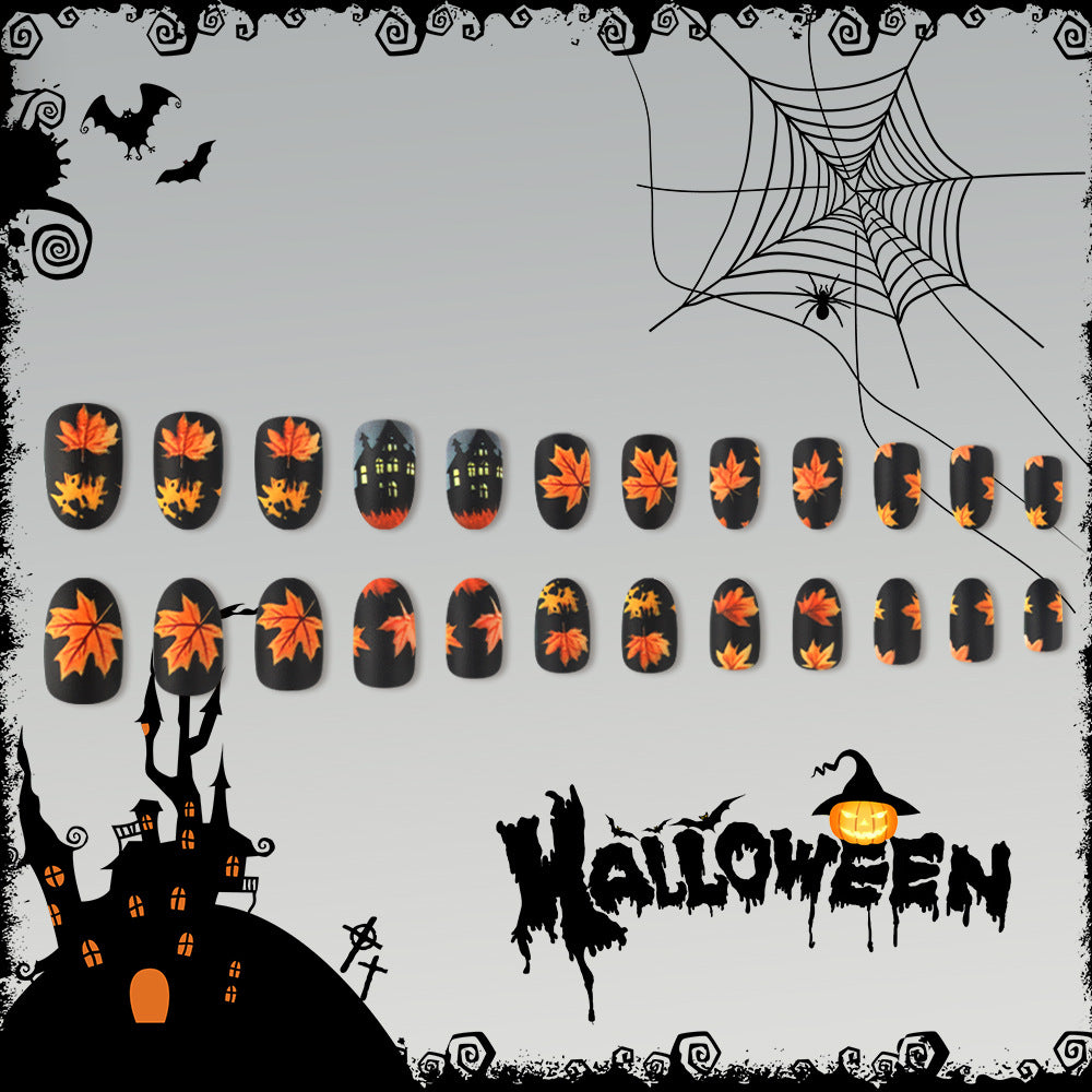 Spooky Autumn Vibes Medium Oval Black with Vibrant Orange Leaf Designs Press on Nail Set