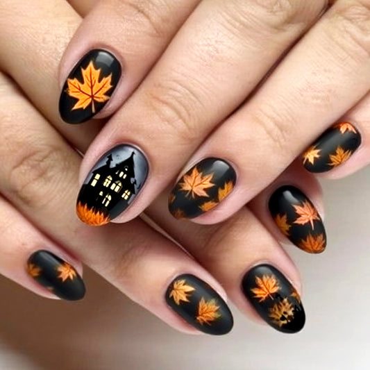 Autumn Enchantment Medium Oval Black Nails with Vibrant Orange Leaf Design