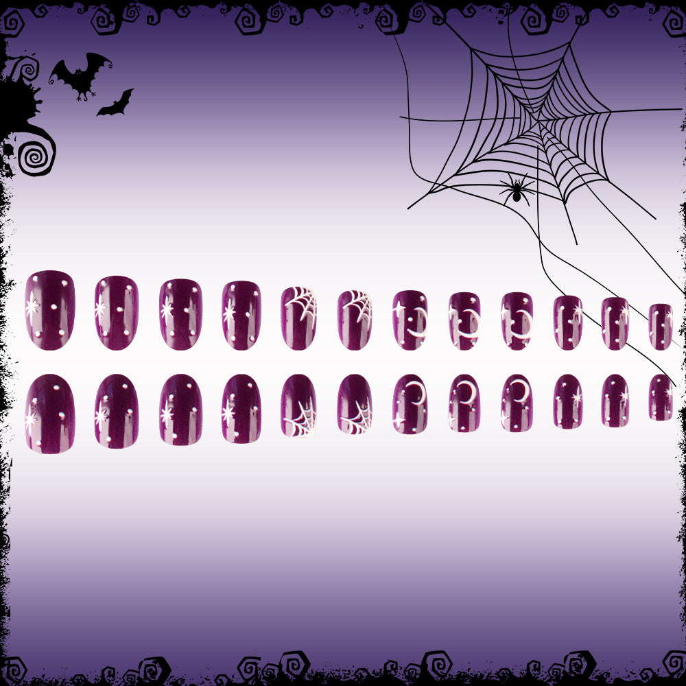 Spooky Elegance Medium Oval Purple Press-On Nail Set with Whimsical Spider Web Design
