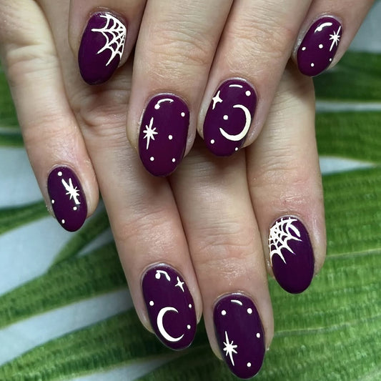 Mystical Night Sky Medium Oval Purple Nails with Celestial Designs