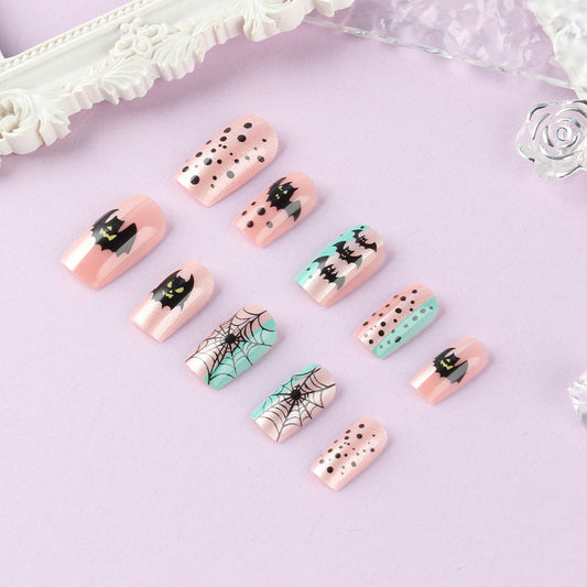 Spooktacular Medium Square Pink Bat and Spider Press On Nail Set Featuring Unique Mixed Patterns and Glossy Finish
