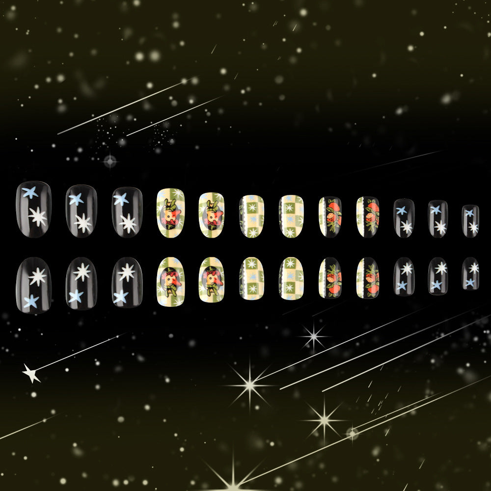 Celestial Charm Medium Oval Black and Yellow Press-On Nail Set with Floral Artistry