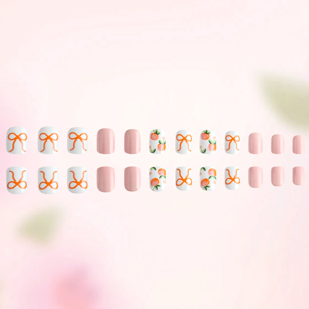 Charming Peach Blossom Press-On Nail Set Short Square Pastel Pink with Delightful Bow and Peach Designs
