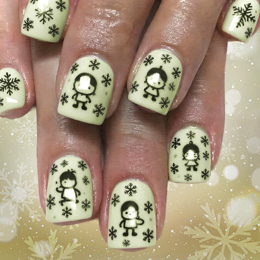 Charming Winter Wonderland Short Square Soft Green Nail Set with Adorable Snowflake and Character Designs