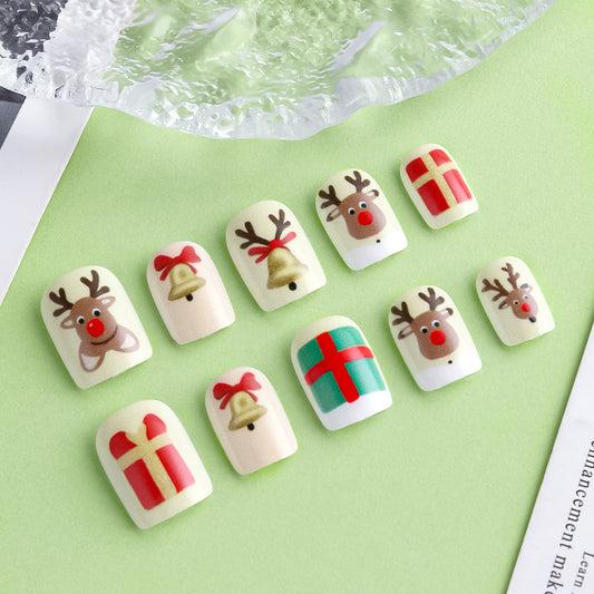 Festive Holiday Press On Nail Set in Short Square Shape Cream Color with Whimsical Christmas Designs