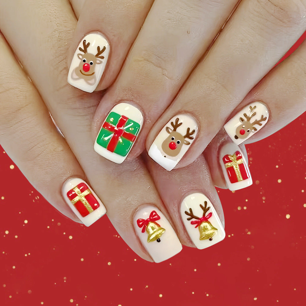 Joyful Holiday Short Square White Nail Set with Festive Reindeer and Gift Designs