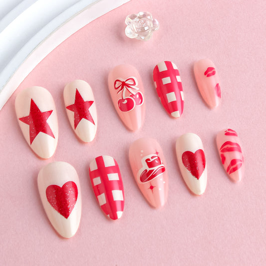Romantic Charm Medium Almond Pink Nails with Stars and Hearts Design