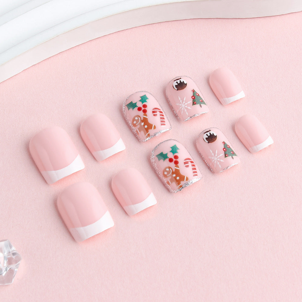Set of pink nail wraps with Christmas designs on a pink background