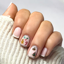 Holiday Cheer Elegant Short Square Press On Nail Set in Soft Pink with Festive Holiday Designs
