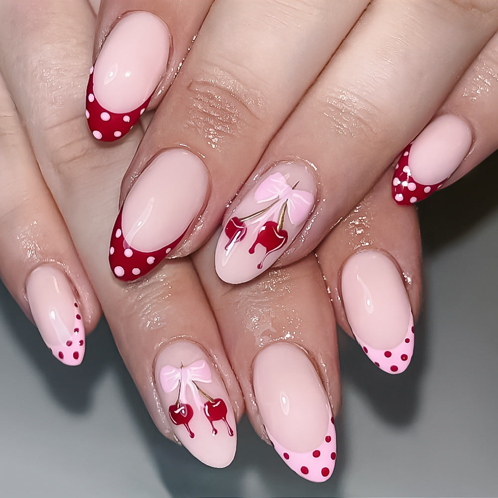 Cherry Bliss Natural Medium Almond Pink Press-On Nail Set with Polka Dots and Whimsical Bow Design