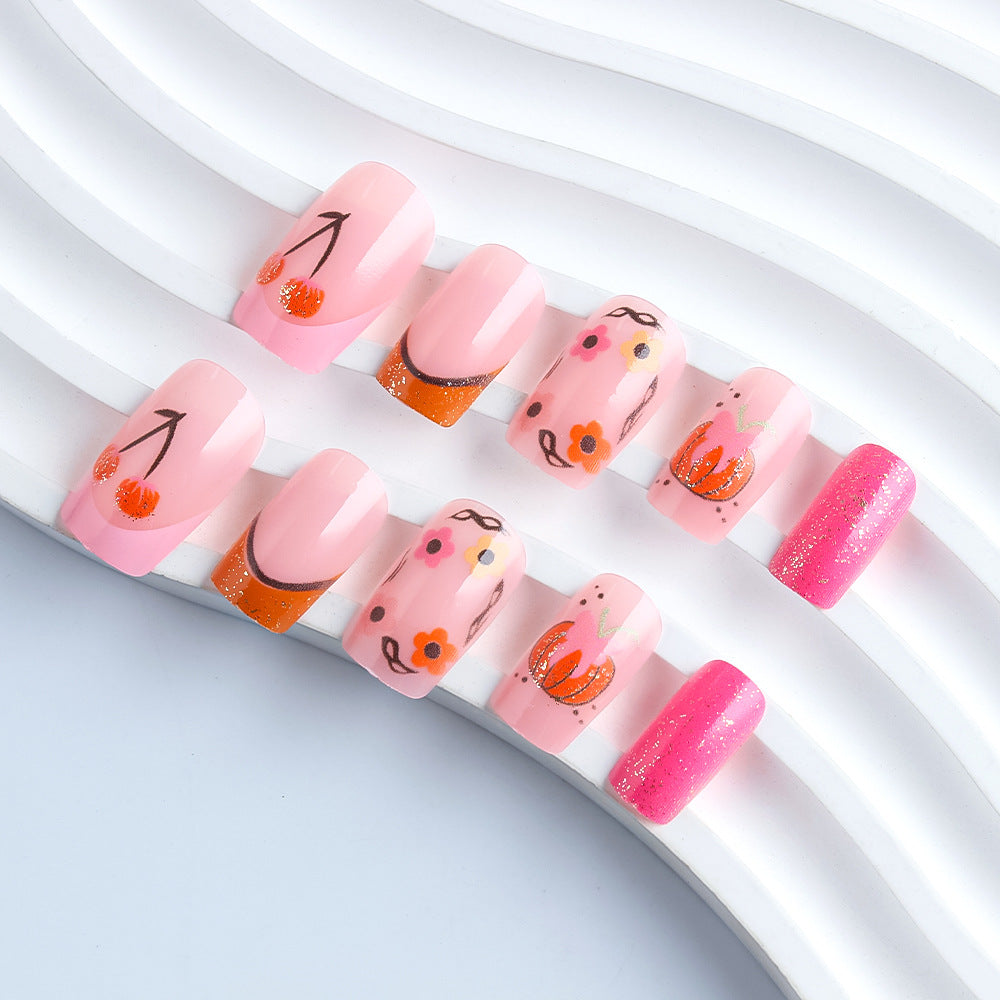 Charming Blossom Inspired Medium Square Pink Press on Nail Set with Floral Designs and Sparkling Accents