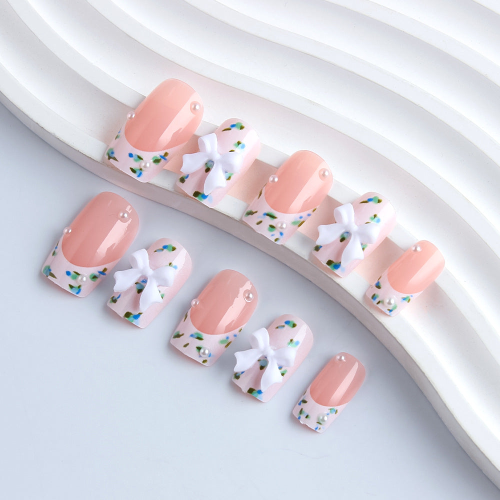 Whimsical Garden Inspired Medium Square Pink Press on Nail Set with Elegant Floral Design and Charming Bow Accents