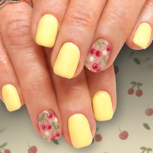 Cherry Blossom Delight Short Square Yellow Nail Set with Whimsical Cherry and Flower Design
