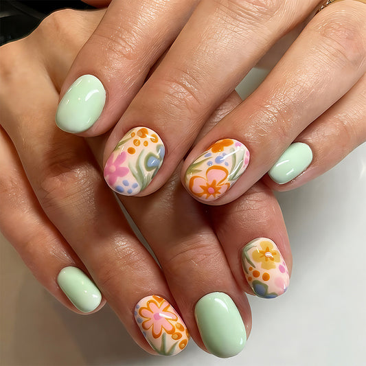Floral Serenity Medium Oval Mint Green Press On Nail Set with Vibrant Hand-Painted Designs