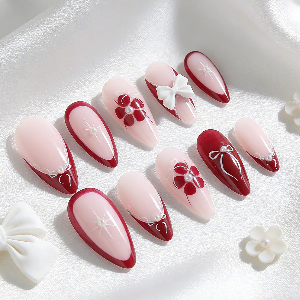 Charming Floral Elegance Long Almond Shaped Deep Red and Soft Pink with Intricate Bow and Pearl Embellishments Press On Nail Set