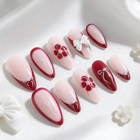 Charming Floral Elegance Long Almond Shaped Deep Red and Soft Pink with Intricate Bow and Pearl Embellishments Press On Nail Set
