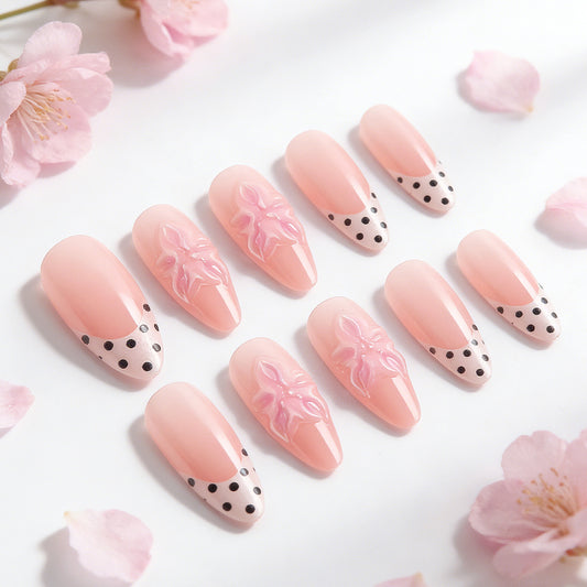 Blossom Dreams Long Almond Pink Nails with Floral Embellishments and Polka Dot Design