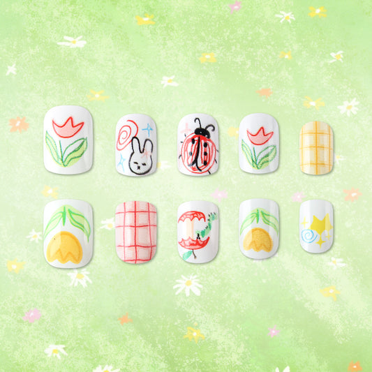 Whimsical Garden Inspired Short Square White Press On Nail Set with Colorful Floral and Cute Character Artwork