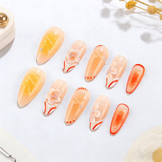 Blossom Elegance Long Almond Gradient Peach with Floral Accents and Gem Embellishments Press On Nail Set