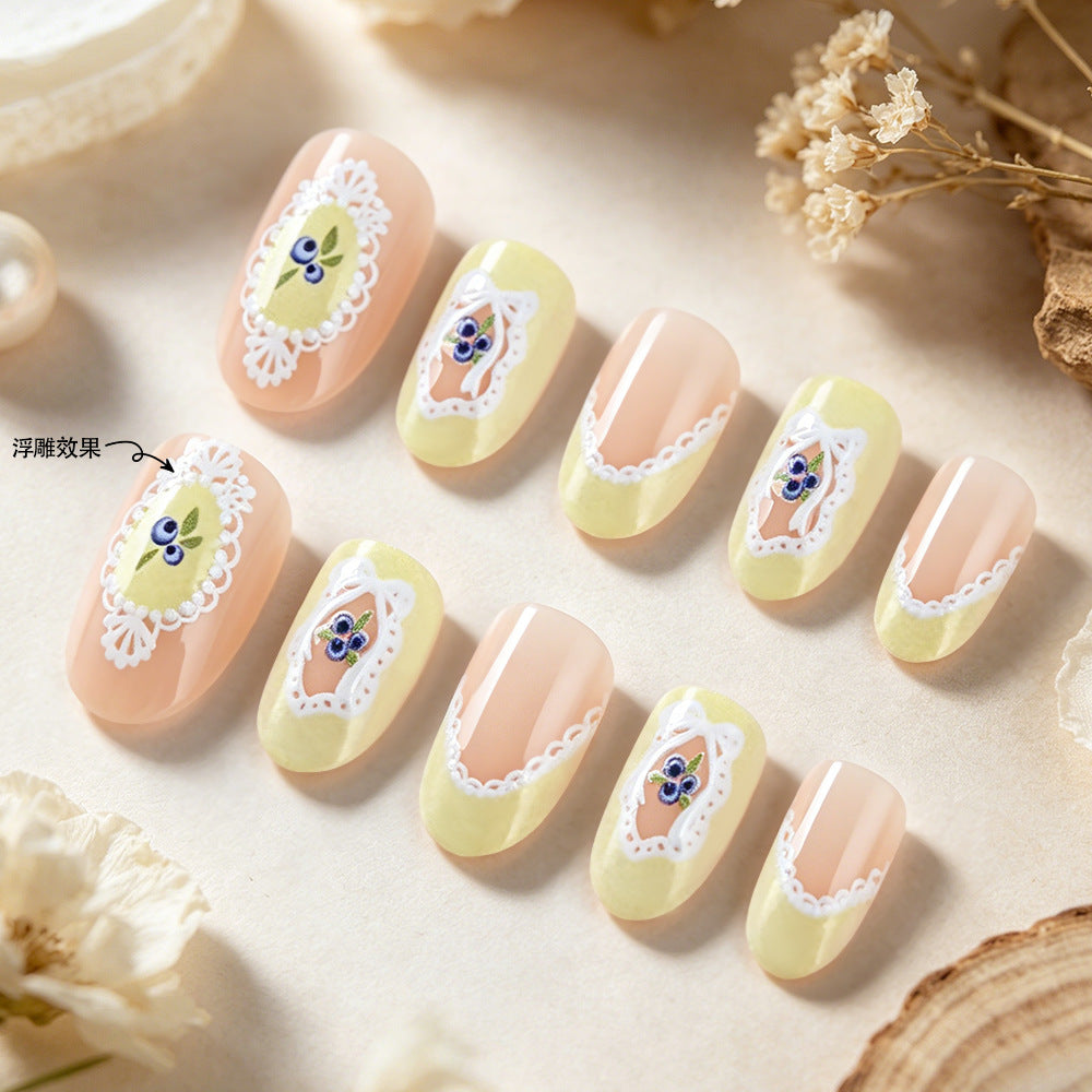 Whimsical Elegance Medium Oval Yellow with Intricate Floral Design Press on Nail Set
