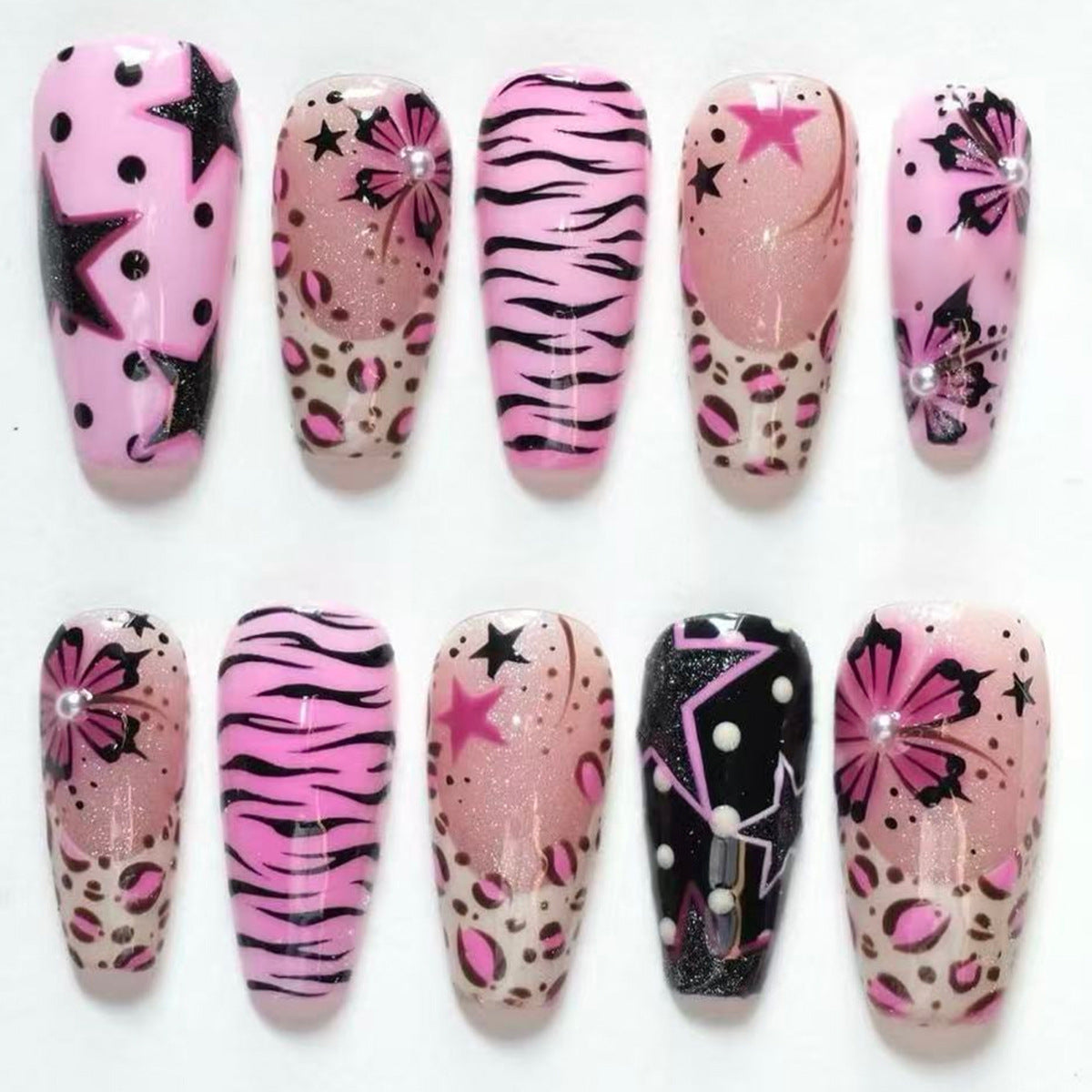 Glamorous Long Coffin Shape Glossy Pink Press On Nail Set Featuring Unique Animal Print and Star Accents