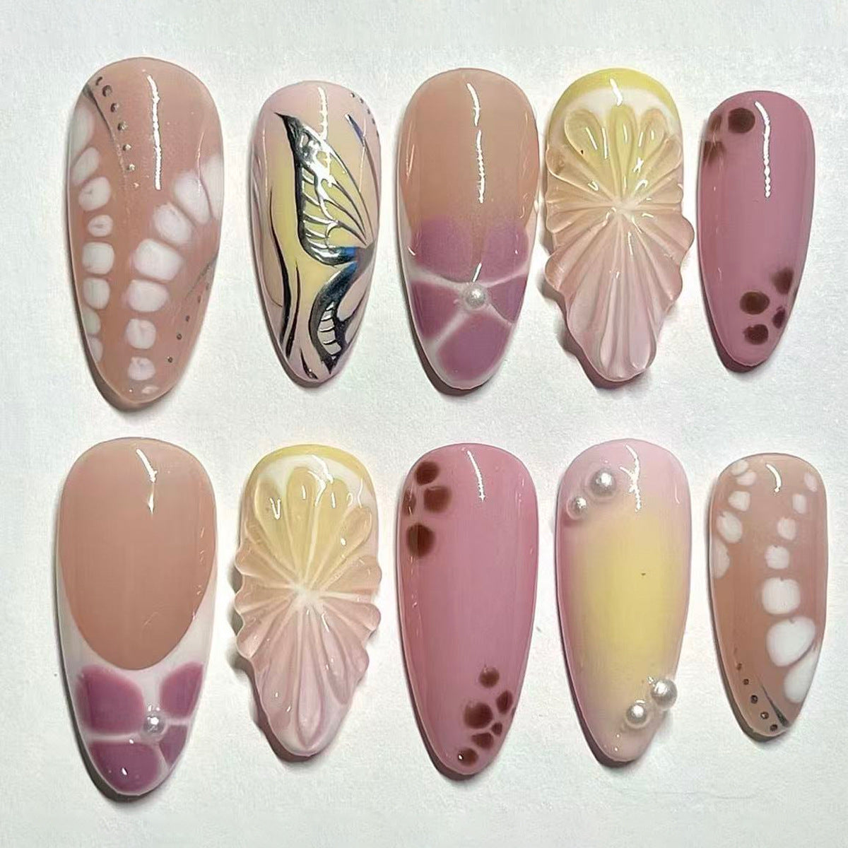 Enchanting Floral Fantasy Medium Almond Pink Press On Nail Set with Elegantly Detailed Designs
