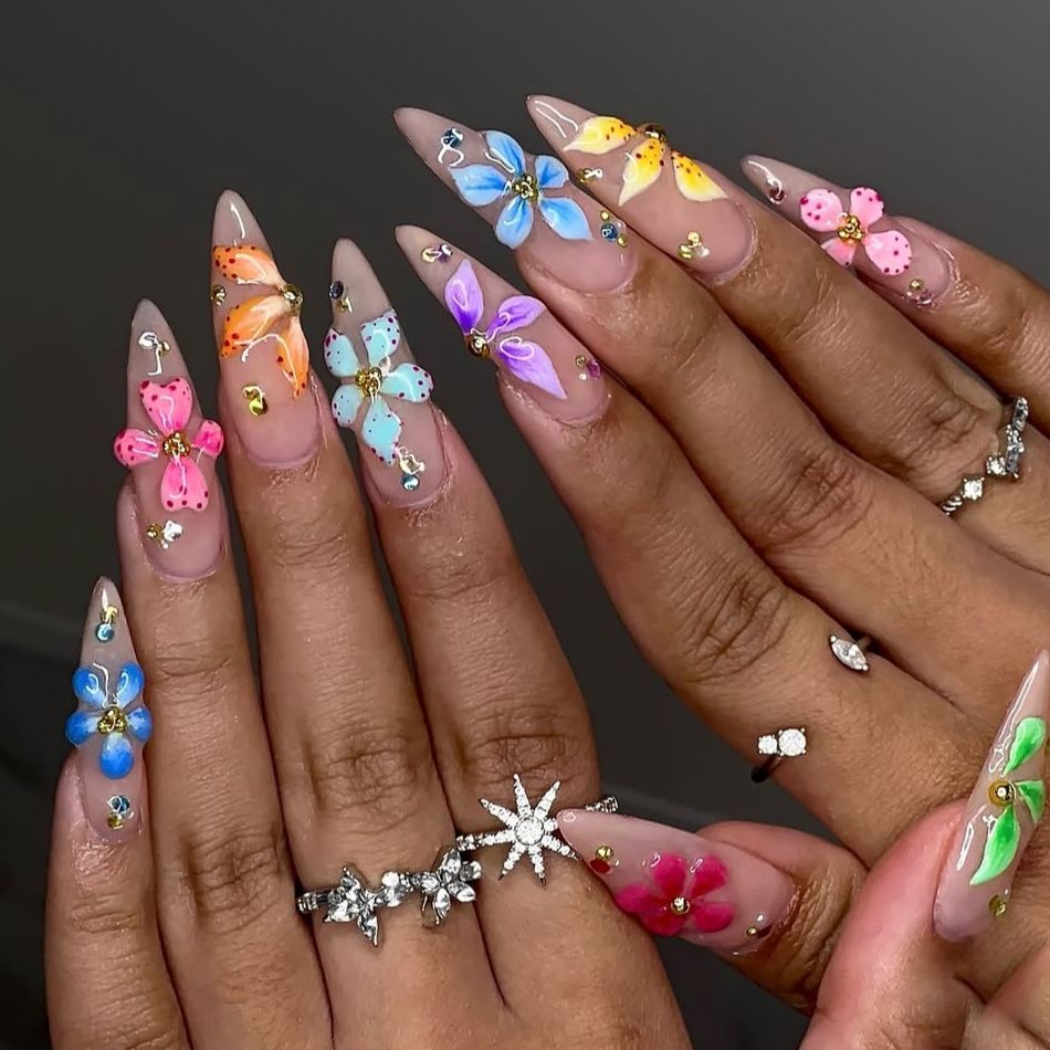 Whimsical Floral Elegance Long Stiletto Vintage Pastel Nails with Charming Butterfly Accents
