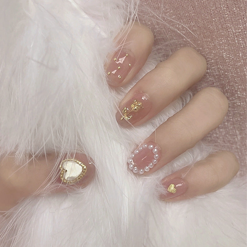 Enchanted Elegance Medium Length Oval Pink Press On Nails with Pearlescent Accents and Gold Flakes