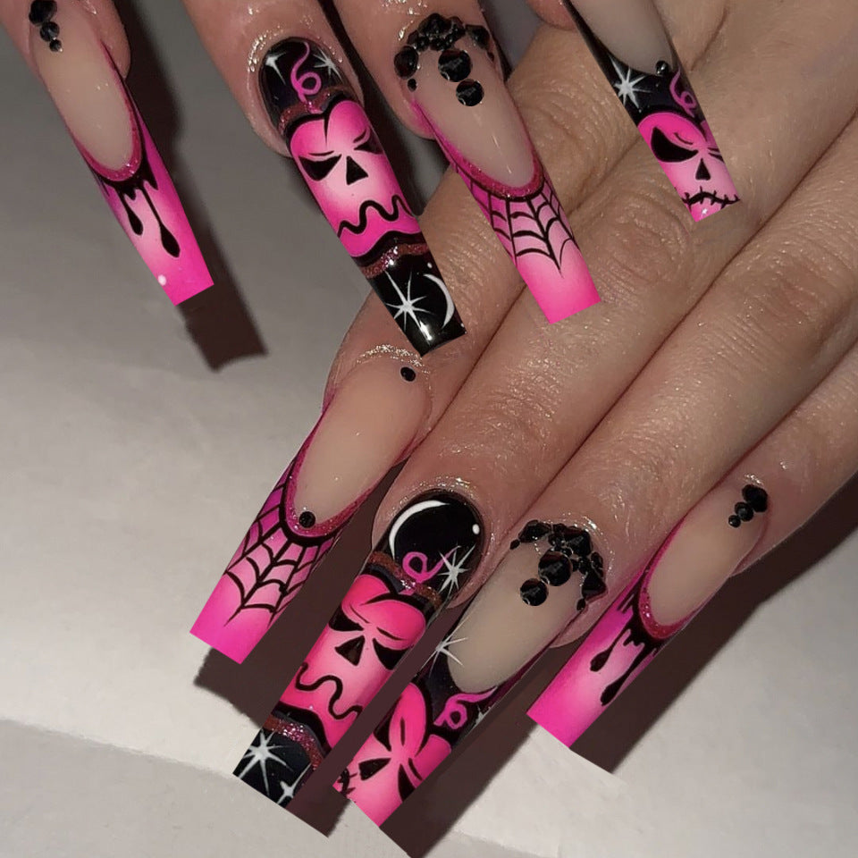 Gothic Charm Long Square Pink and Black Nail Set with Intricate Halloween Patterns and Sparkling Accents