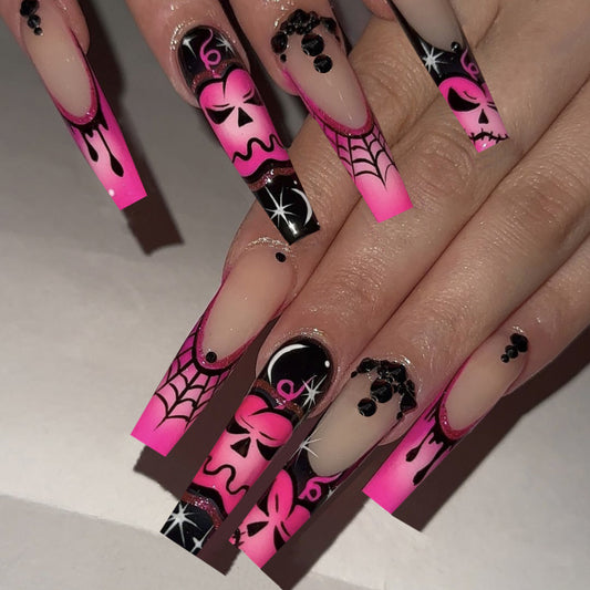 Gothic Charm Long Square Pink and Black Nail Set with Intricate Halloween Patterns and Sparkling Accents