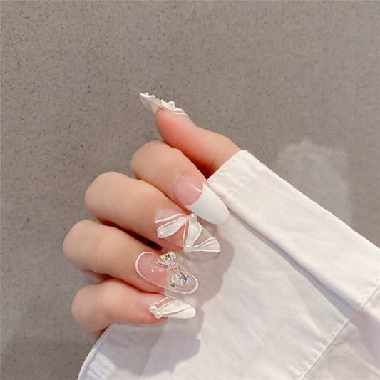 Elegant Bridal Collection Long Oval White Press On Nail Set with Bow Accents and Rhinestone Embellishments