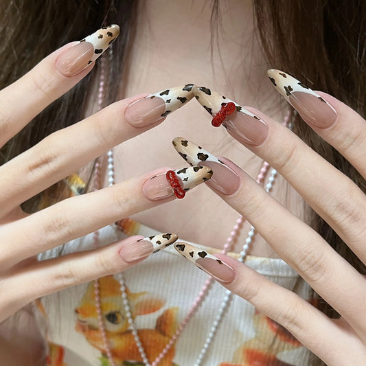 Safari Chic Long Almond Animal Print Press On Nails with Red Bow Detail