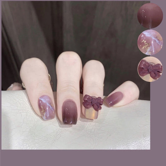 Elegant Orchid Inspired Short Square Purple Press On Nail Set with Charming Bow Accent and Unique Marble Design