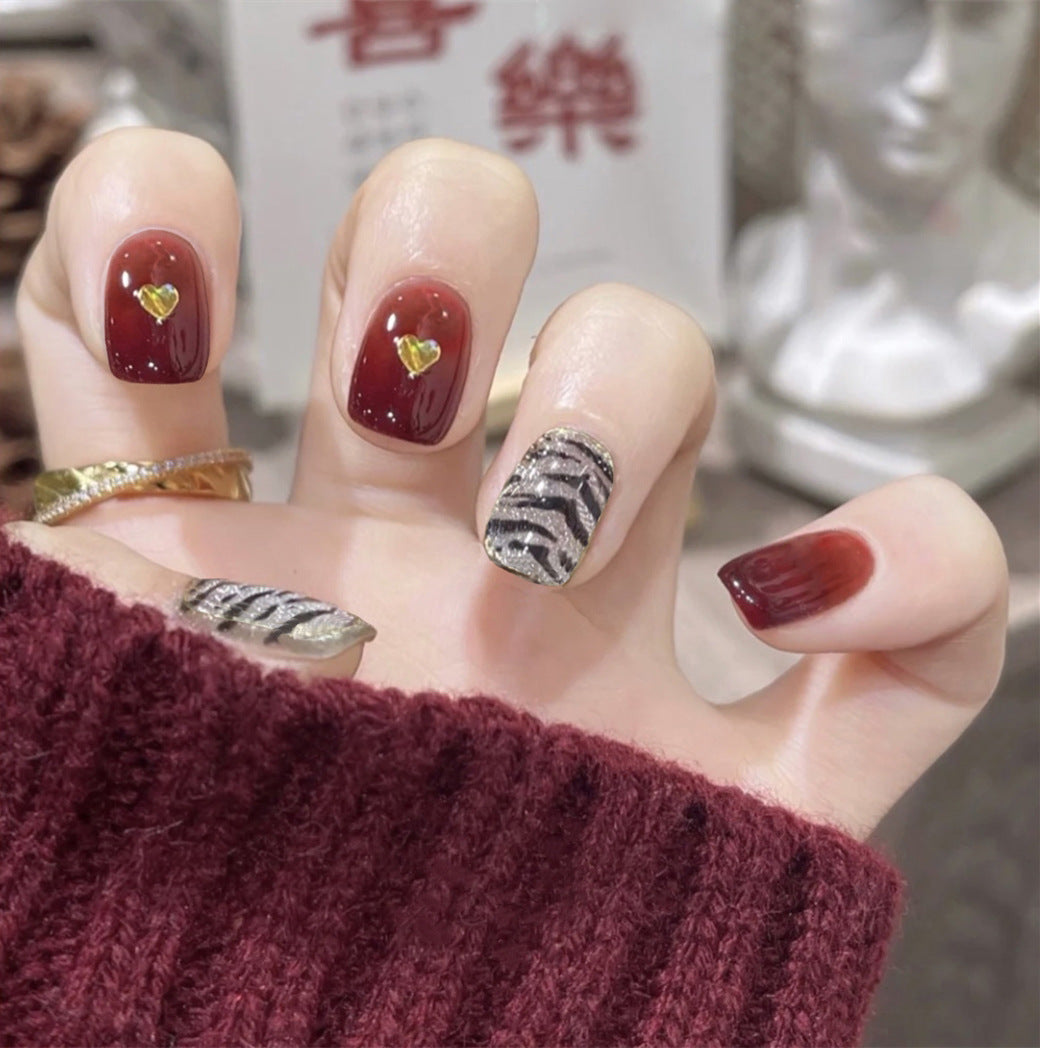 Luxury Burgundy Elegance Medium Square Press On Nails with Golden Heart Accents and Metallic Stripe Feature
