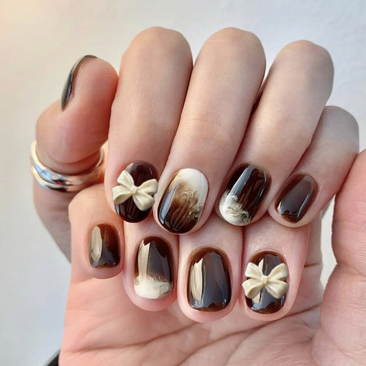 Autumn Elegance Short Round Brown and Cream Marble Press On Nails with Gold Accent Bow Design