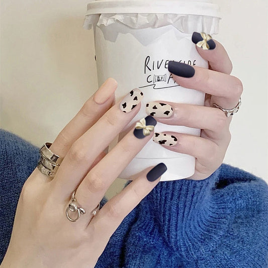 Fashionista's Choice Long Square Matte Black and Beige Leopard Print Press-On Nails with 3D Bow Accents