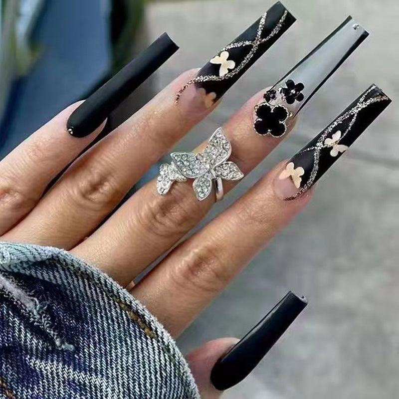 Enchanted Evening Extra-Long Coffin Black Press On Nails with Delicate Floral Accents and Glitter Detail
