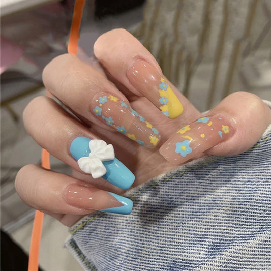 Springtime Blossom Extra-Long Coffin Press On Nail Set in Pastel Blue, Yellow with Floral Accents and 3D Bow Design