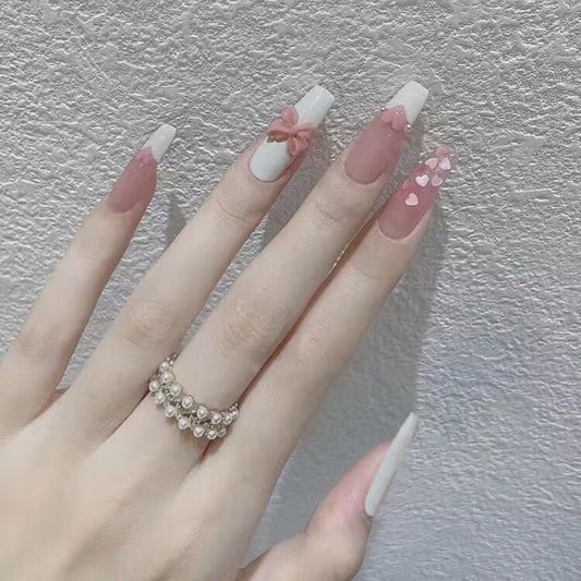 Enchanted Elegance Extra Long Coffin Pink and White Ombre Press On Nail Set with Bow and Heart Accents