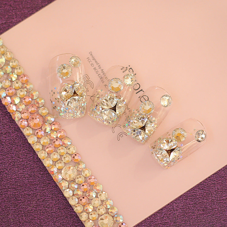 Crystal-embellished jewelry set on a pink and purple background