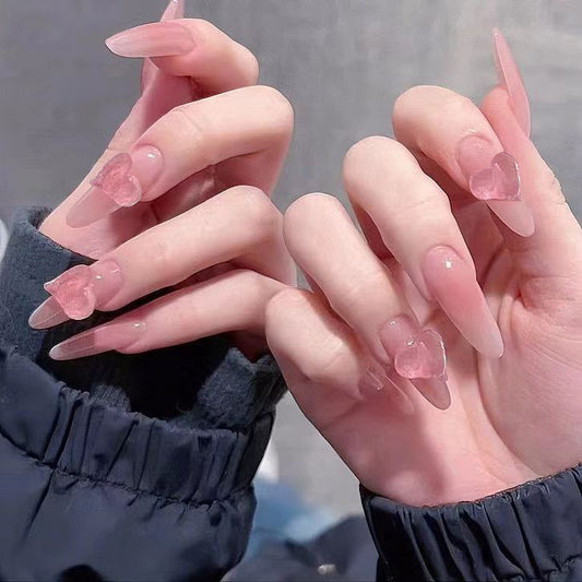Romantic Pink Long Almond Nails with Heart Shaped Decorative Tips