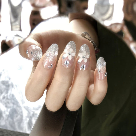 Glistening Floral Wonderland Long Oval Silver and Clear Press On Nail Set with Rhinestone and Flower Accents