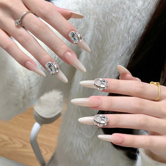 Glamorous Elegance Long Almond Beige Press On Nail Set with Stunning Rhinestone Accents