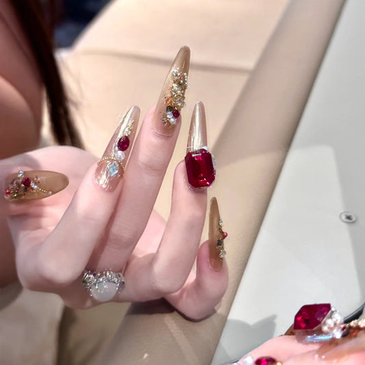 Glamorous Fantasy Long Stiletto Beige Nails with Jewel Accents