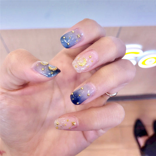 Stellar Twilight Medium-Length Squoval-Shaped Pink and Blue Glittery Press-On Nail Set with Celestial Accents