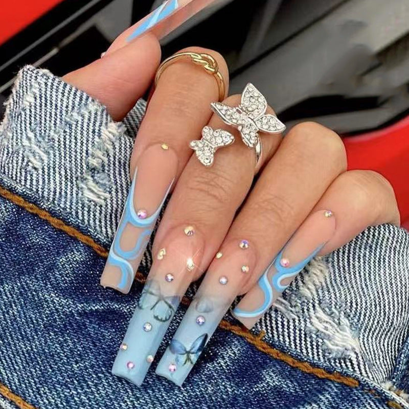 Enchanted Butterfly Theme Extra Long Coffin Sky Blue Press On Nails with Rhinestone Accents and Translucent Details