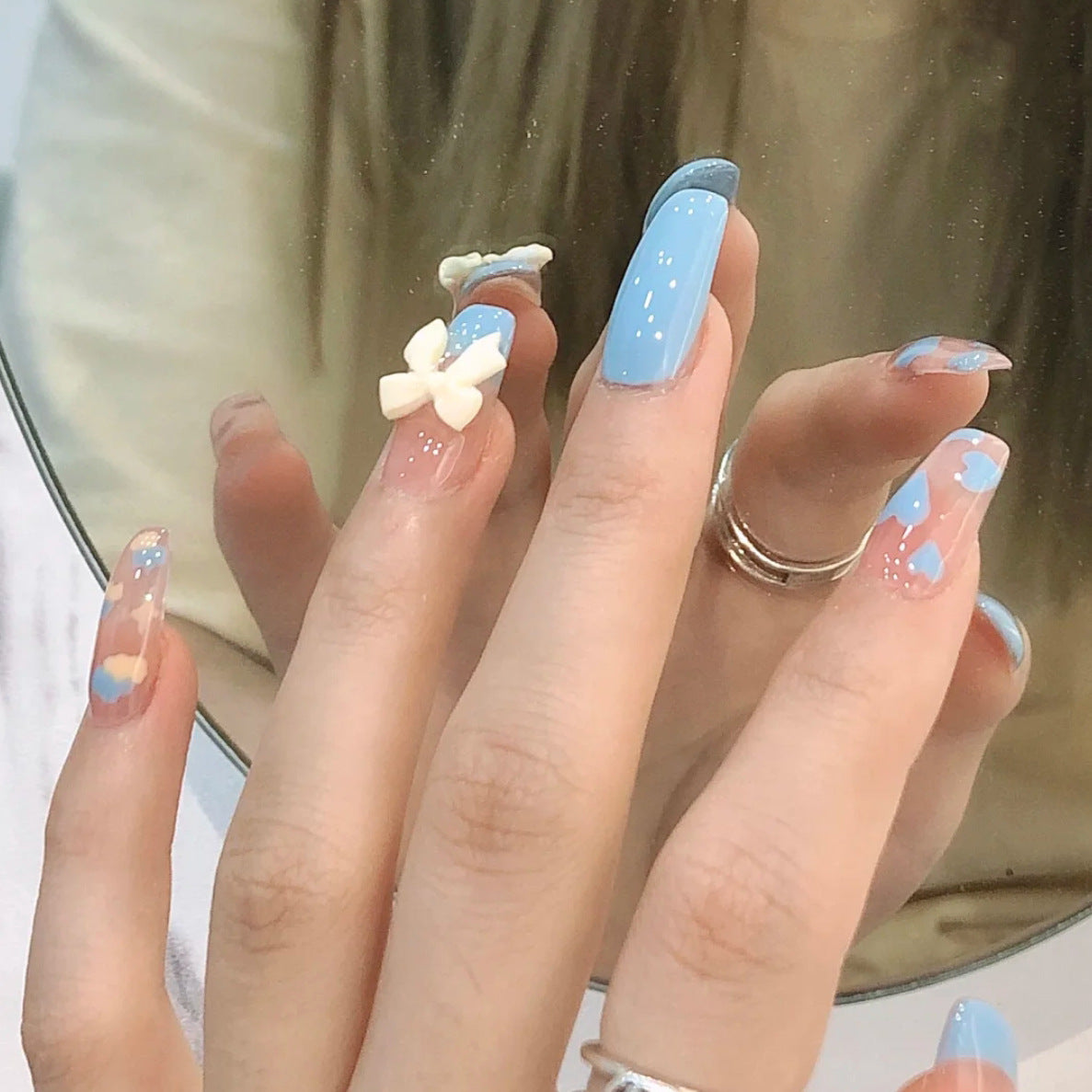 Spring Blossom Medium Coffin Blue Press On Nail Set with Floral Accents and Glitter Highlights